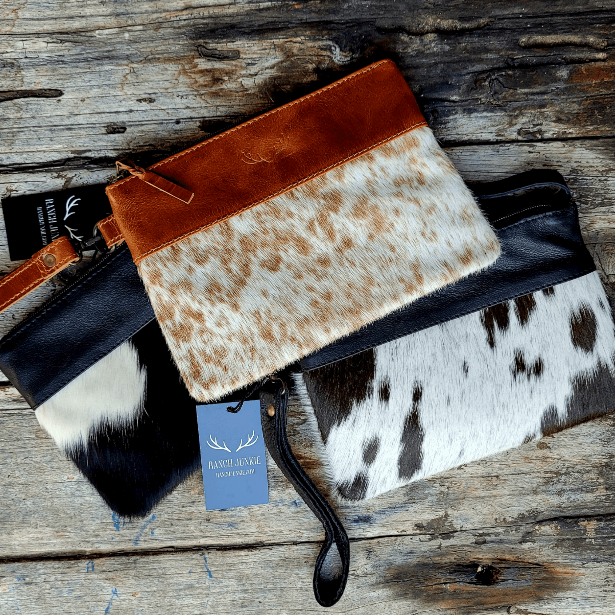 Genuine Cowhide Wristlet Highlands Clutch Bag: Antique Saddle Brown